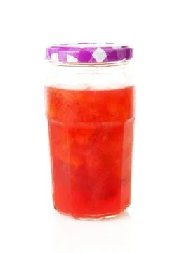 Pot of plums jam over white Stock Photos