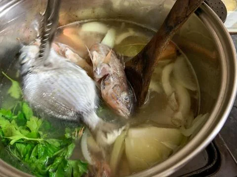 Pot with prepared to make fish broth. With fresh fish caught the same day. Va Stock Photos