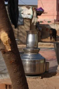 A pot that is sitting on a table Stock Photos