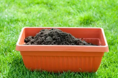 Pot with soil Stock Photos
