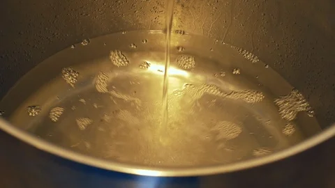 Pot still during process of distillation, Plum liquor slivovitz traditional 動画素材 102539283