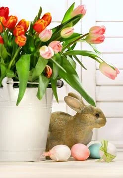Pot of tulips with rabbit Stock Photos