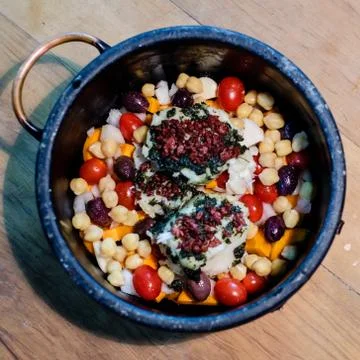 Pot of vegetables and cod fish ready to be consumed Stock Photos