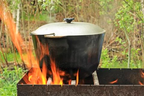 Pot water on the fire 스톡 사진