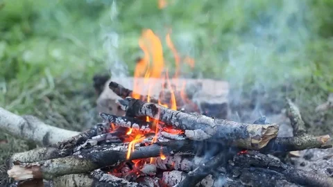 The pot of water hangs over the fire. bowler is removed from the fire. Close-up Stock Footage 83363510