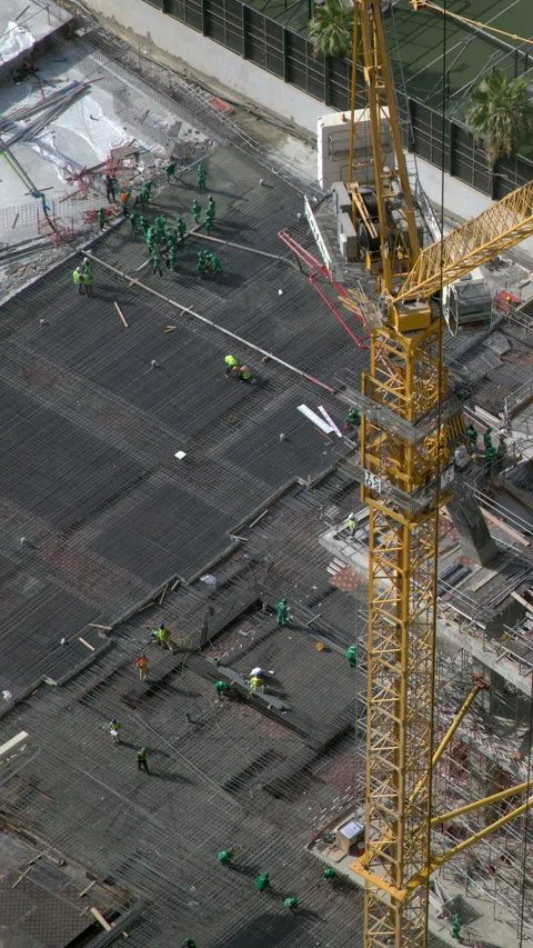 Potain tower crane on Dubai construction site timelapse Stock Footage 340443746