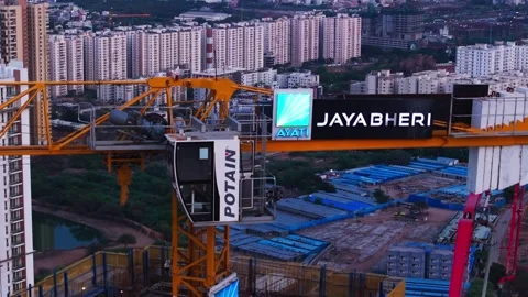 Potain Tower crane working in Ayati Jaya Bheri projects and background high Stock Footage 339644232