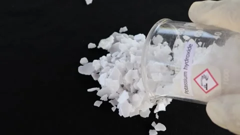 Potassium hydroxide flake  Stock Footage 164082792