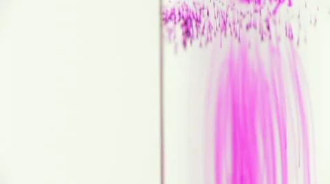 Potassium permanganate fall in water of a test tube laboratory Stock Footage 67452551