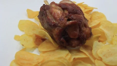 Potato bed with roasted pork knuckle Stock Footage 104752705