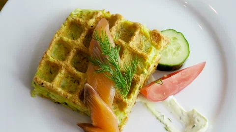 Potato casserole. Pudding in shape of waffles with vegetables, smoked salmon. 4K 库存影片 108460931