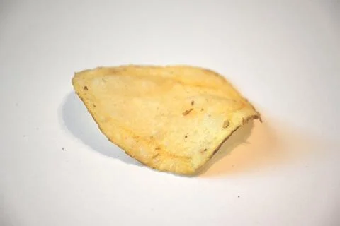 Potato Chip Close-Up on White Background, Minimal Snack Food Concept Stock Photos