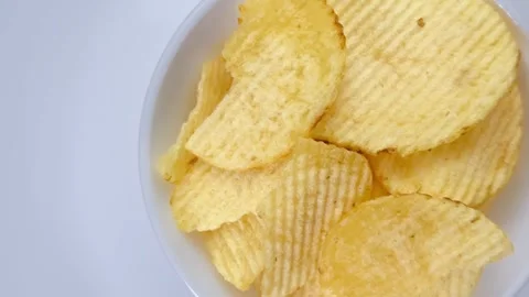 Potato chips in a bowl 動画素材 258065859