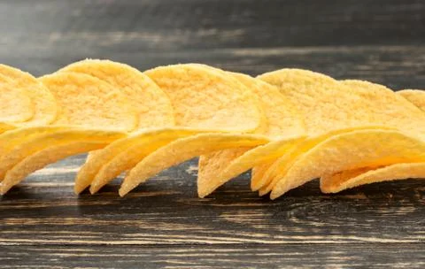 Potato chips with cheese Stock Photos