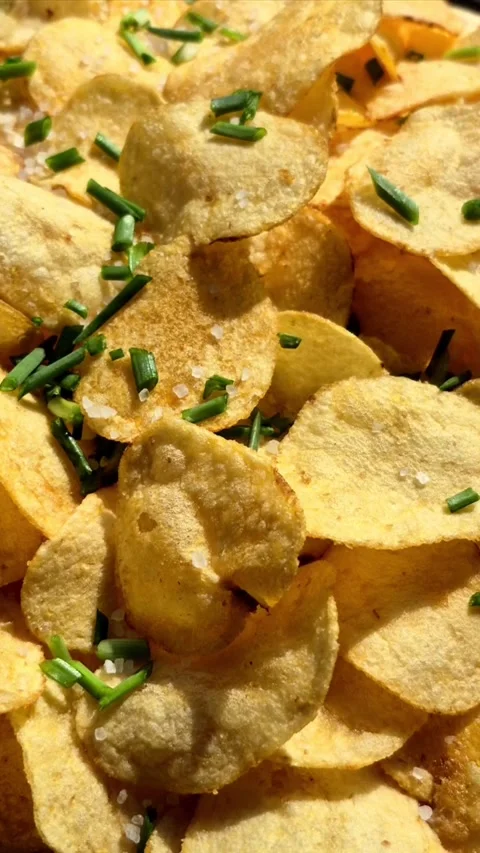 Potato chips close-up in motion Video stock 305235104
