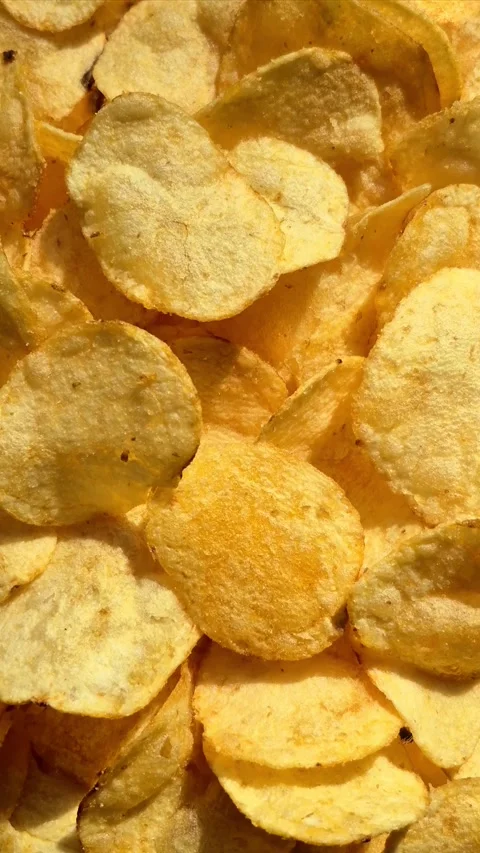 Potato chips close-up in motion Stock Footage 305235133
