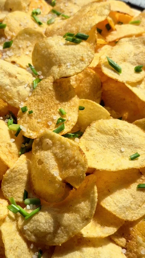 Potato chips close-up in motion Stock Footage 305235178