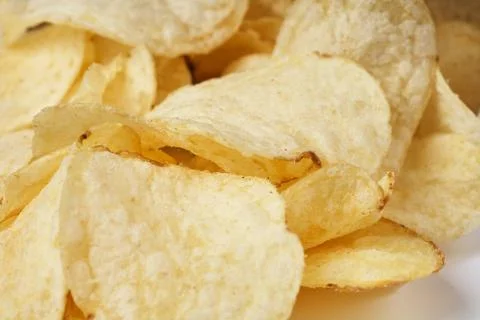 Potato chips close-up. Stock Photos