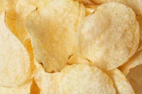 Potato chips close-up. Stock Photos