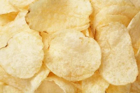 Potato chips close-up. Stock Photos