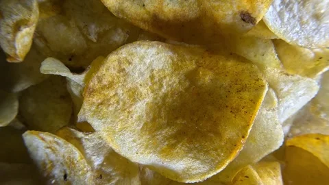 Potato Chips - Close Up Shot - Backwards Stock Footage 283893086