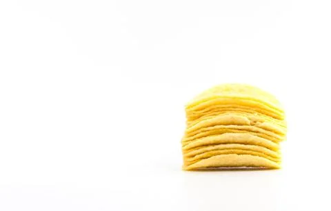 Potato chips crisps on white background Stock Photos