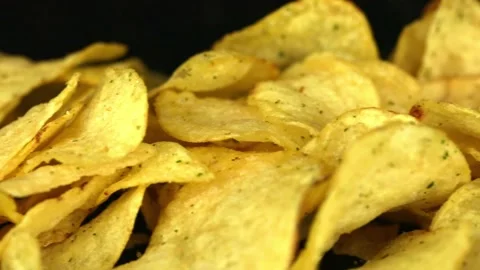 Potato chips on a dark background 動画素材 229503622