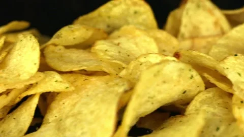 Potato chips on a dark background Vídeo Stock 232020816