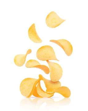 Potato chips fall on a heap with chips isolated on a white background Stock Photos