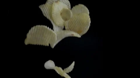 Potato Chips falling down. slow motion shot Stock Footage 112822853