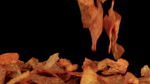 Potato Chips Falling Into Pile Against Black Background Stock Footage 315329510