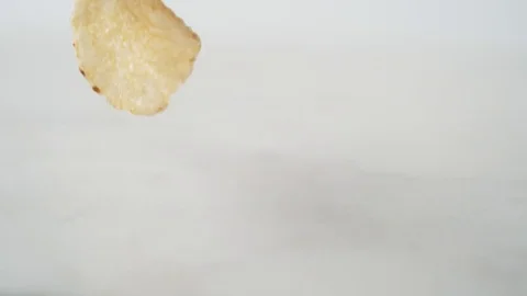 Potato chips falling. Slow Motion. Stock Footage