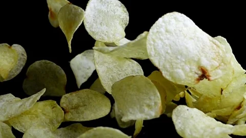 Potato Chips floating up. slow motion shot Stock Footage 112823029