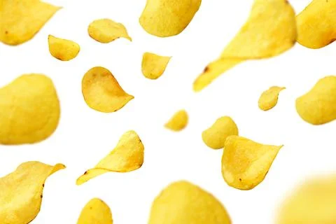 Potato chips flying on white background Stock Illustration