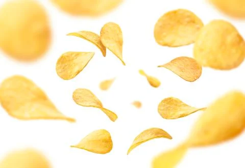 Potato chips levitate on a white background Illustrazione stock