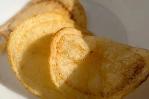 Potato chips macro texture Stock Photos