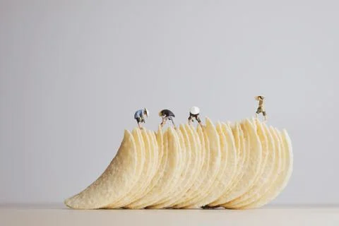 Potato chips making concept. Macro photo Stock Photos