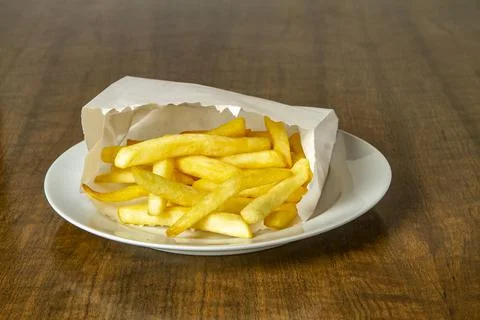 Potato chips in a paper bag Stock-Fotos