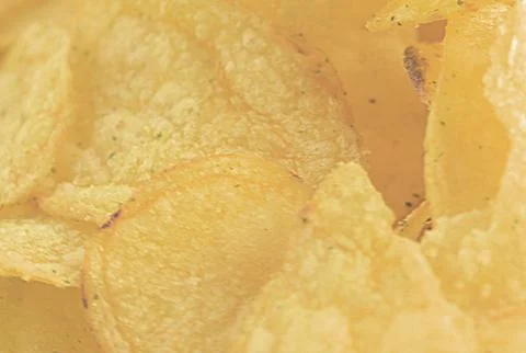 Potato chips on a plate Stock Photos