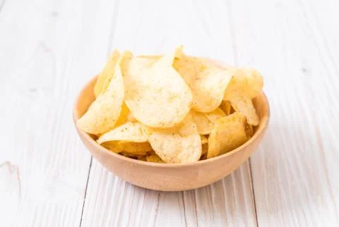 Potato chips on plate Stock Photos