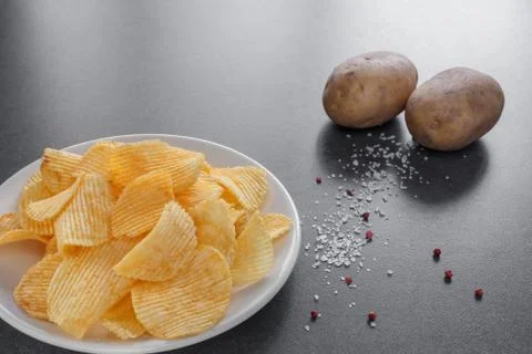 Potato chips on a plate Stock Photos