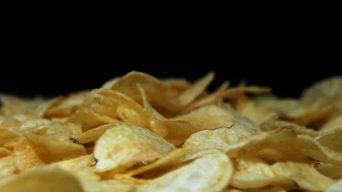 Potato Chips Rotating On Black Background Stock Footage 69719278