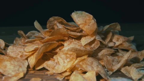 Potato Chips Rotating On Black Background Stock Footage 69846325