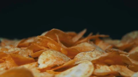 Potato Chips Rotating On Black Background Stock Footage 69914088