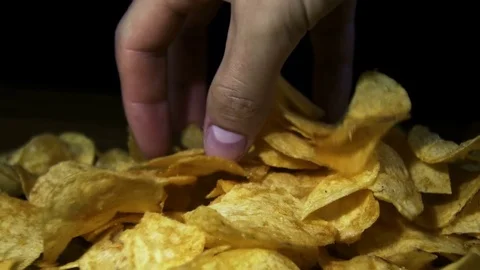 Potato Chips Rotating On Black Background Stock Footage 69937598