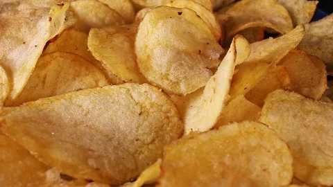 Potato chips rotating texture pattern closeup footage Stock Footage 97229975