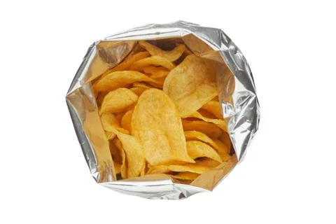 Potato chips in a silver package isolated on a white background close-up. Stock Photos