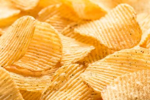 Potato chips texture background. Potatoes pattern Stock Photos