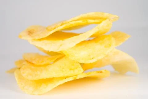 Potato chips on a white background Stock Photos