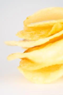 Potato chips on a white background Stock Photos